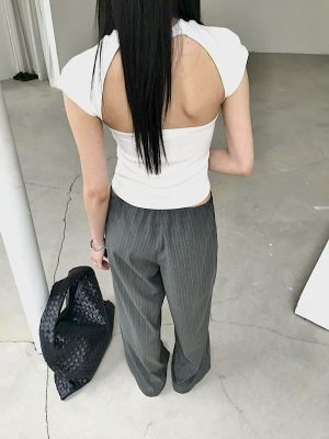 大弧度露背包肩上衣